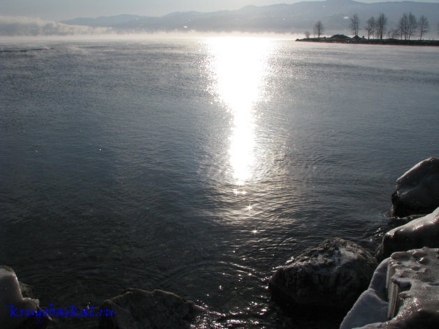   :  ,  , .    . Photo of Lake Baikal in winter. Southern coast of Lake Baikal in winter, near Kultuk, in January. Solar path on the water