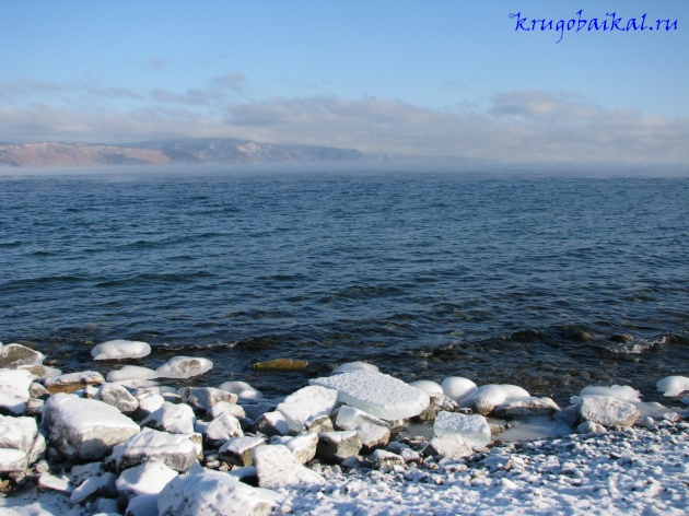   :  ,  , .    . Photo of Lake Baikal in winter. Southern coast of Lake Baikal in winter, near Slyudyanka, in January. View on Olkha plateau