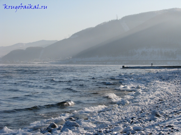   :  ,   , . Photo of Lake Baikal in winter. Southern coast of Lake Baikal in winter, embankment in Sludyanka, breakwater