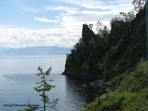   .   .      .  . Photo of Lake Baikal. Southern coast of Lake Baikal, Circum-Baikal Railway, in August. Stolby cape