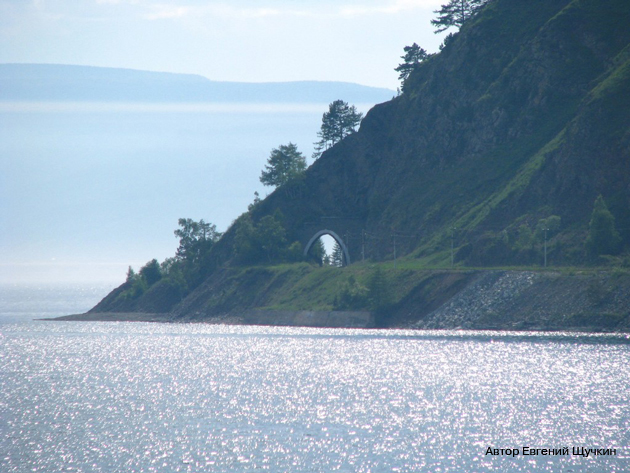   .  , .     . Photo of Lake Baikal. Southern coast of Lake Baikal, in August. Tunnel on the Circum-Baikal Railway